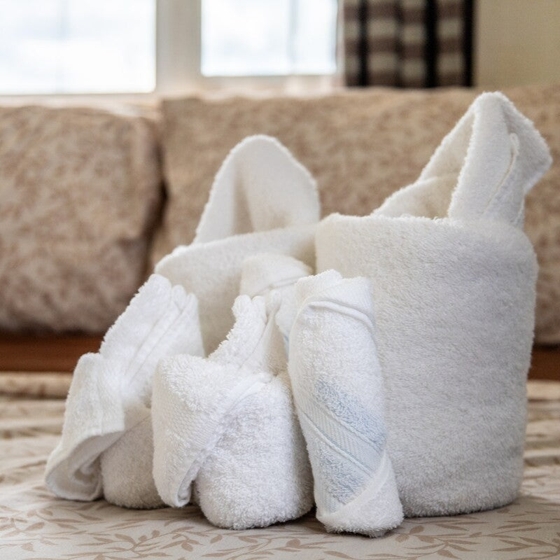 A complete set of plush towels for each guest